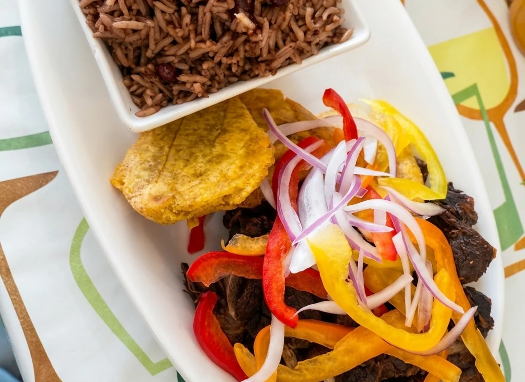 Goat and rice at Caribbean Latino Finger Licking Restaurant in Eastwood, Edmonton